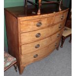 A George III mahogany bow fronted four-height chest of drawers (faded), together with a tin trunk (