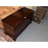 A modern mahogany blanket box and a floral upholstered blanket box (2)