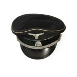 A German Third Reich SS Officer's Visor Cap, in black wool with velvet centreband, set with white