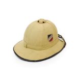 A German Third Reich 1940 Pattern Tropical Pith Helmet, of cork covered in light tan canvas, the