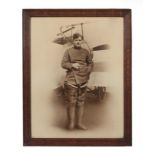 A Sepia Vignette Photograph of Royal Flying Corps Pilot Lieutentant William Leefe Robinson, standing