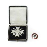 A German Third Reich War Merit Cross with Swords, first class, early issue, silver plated, with