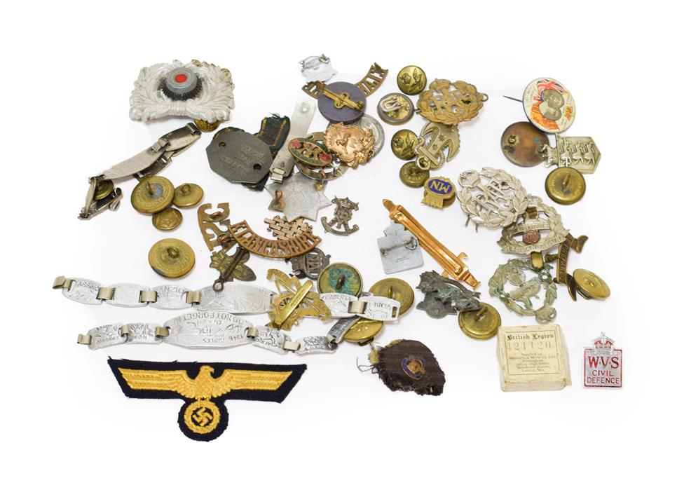 A Small Quantity of Second World War Militaria, including RAF cap badges and buttons, shoulder