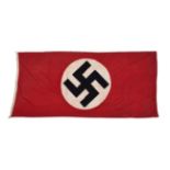 A German Third Reich NSDAP Flag, double sided, each side of the red cotton field applied with