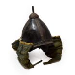 A Korean ''War'' Helmet, possibly 17th Century, of black lacquered leather with four vertical