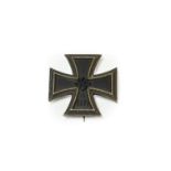A German Third Reich Iron Cross, first class, non-magnetic, the reverse with vertical sword shape