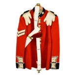 An Elizabeth II Home Service Dress Part Uniform to the Coldstream Guards, comprising a scarlet tunic