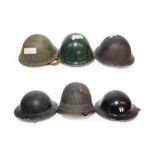 A Collection of British Military Headgear, comprising two Second World War black painted Brodie