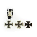 A First World War German Iron Cross, second class, the ribbon set with 1939 spange; a First World