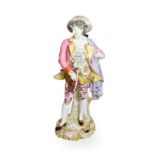 A Continental hard-paste porcelain figure of a musician, 46cm high