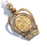 A 1908 half sovereign mounted as a pendant with crown, length 4.4cm . Mount hallmarked 9 carat gold.