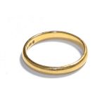 A 22 carat gold band ring, finger size K. Gross weight 2.6 grams.