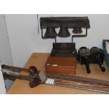 Swiss bells, pair of coaching lamps, oak box, split cane rod and golf clubs