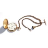 A full hunter pocket watch, signed Waltham, case stamped '10C', with a curb link 9 carat gold