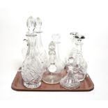 A silver collared decanter, together with two pairs and another three decanters (8)
