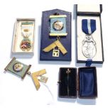 A collection of Masonic medals including two 9 carat gold and enamel medals signed 'North York Lodge