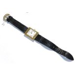 A Roy King silver gilt tank faced wristwatch on leather strap