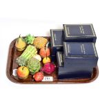A group of ten Halcyon Days enamel trinket boxes in the form of fruit and vegetables