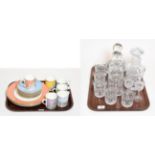 A small part suite of cut glass comprising a pair of decanters and stoppers, tumblers, etc, a cut
