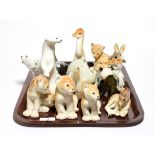 Collection of USSR carved animal figures including an elephant, seal, etc
