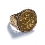 A 1930 full sovereign mounted as a ring, finger size S. Shank stamped '9CT'. Gross weight 14.65