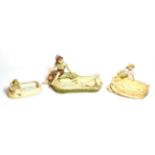Three post 1919 Royal Dux figural dishes, largest 32cm wide