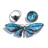 A butterfly brooch, stamped 'SILVER', length 6.7cm, a circular brooch, stamped '925' and a ring,