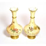 A pair of Royal Worcester blush ivory floral painted vases, shape number: 1538, 27cm high