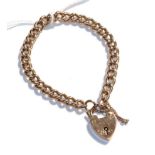 A curb link bracelet with a 9 carat gold heart shaped padlock clasp, length 19.5cm . Gross weight