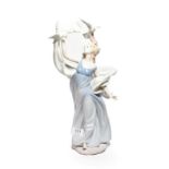 A Lladro figure of a girl and a dove 'Inspiration'