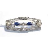 An Art Deco synthetic sapphire, diamond and split pearl brooch, the central rose cut diamond flanked