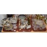 A quantity of silver-plated flatware, twin-handled bowl, entree dish, spirit kettle, brass