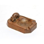 A Robert Mouseman Thompson English oak ash tray, with carved mouse signature