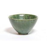 A Chinese green glazed tea bowl