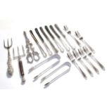 A collection of assorted silver and silver plate flatware, the silver comprising two differing pairs