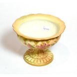 A Royal Worcester blush ivory floral painted pedestal bowl, shape number: 2287, 14cm high