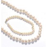 A cultured pearl necklace, length 47cm, a cultured pearl bracelet, length 20.5cm and a pair of