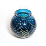 A Mdina glass vase, globular blue with orange flecks