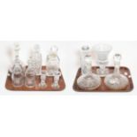 Two trays of glass including two pairs of decanters, four further decanters, a vase and a pair of