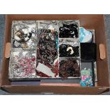 A quantity of costume jewellery, including amber type necklaces, bead necklace and bracelets,