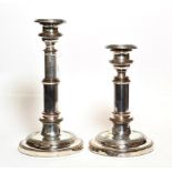 A pair of Old Sheffield plate telescopic candlesticks, each on domed circular base, with plain