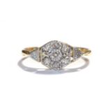 A diamond cluster ring, stamped '18CT', finger size J. Gross weight 1.7 grams.