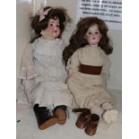 An Armand Marseille bisque socket head doll impressed 390, with sleeping blue eyes, open mouth