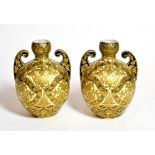 A pair of Royal Crown Derby gilt decorated twin handled vases, 18cm high