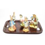 Beswick Beatrix Potter figures including: 'Peter and the Red Pocket Handkerchief', BP-10a, 'Peter