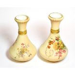 A near pair of Royal Worcester blush ivory and floral painted vases, shape numbers: 2187, 27cm high