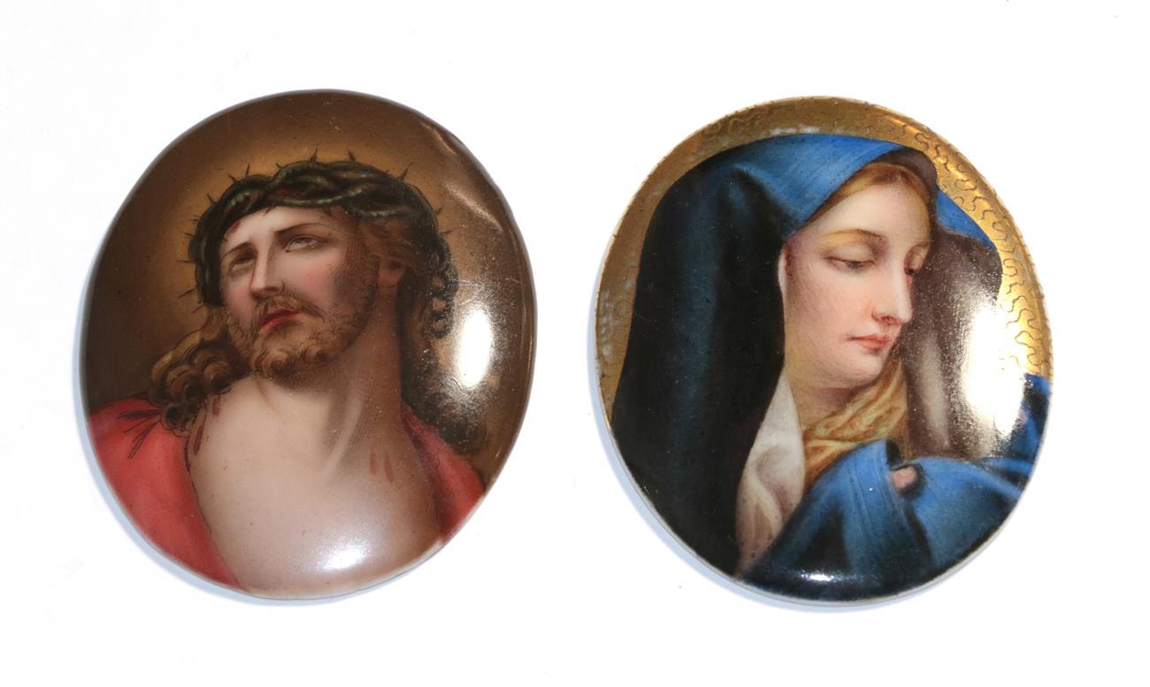 Two oval Continental porcelain plaques, depicting Christ and Mary