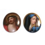 Two oval Continental porcelain plaques, depicting Christ and Mary