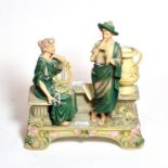 A post 1919 Royal Dux figure group of musicians, 30cm high