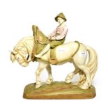 A post 191 Royal Dux model of a shire horse with young boy astride, model number: 1693, 36cm high